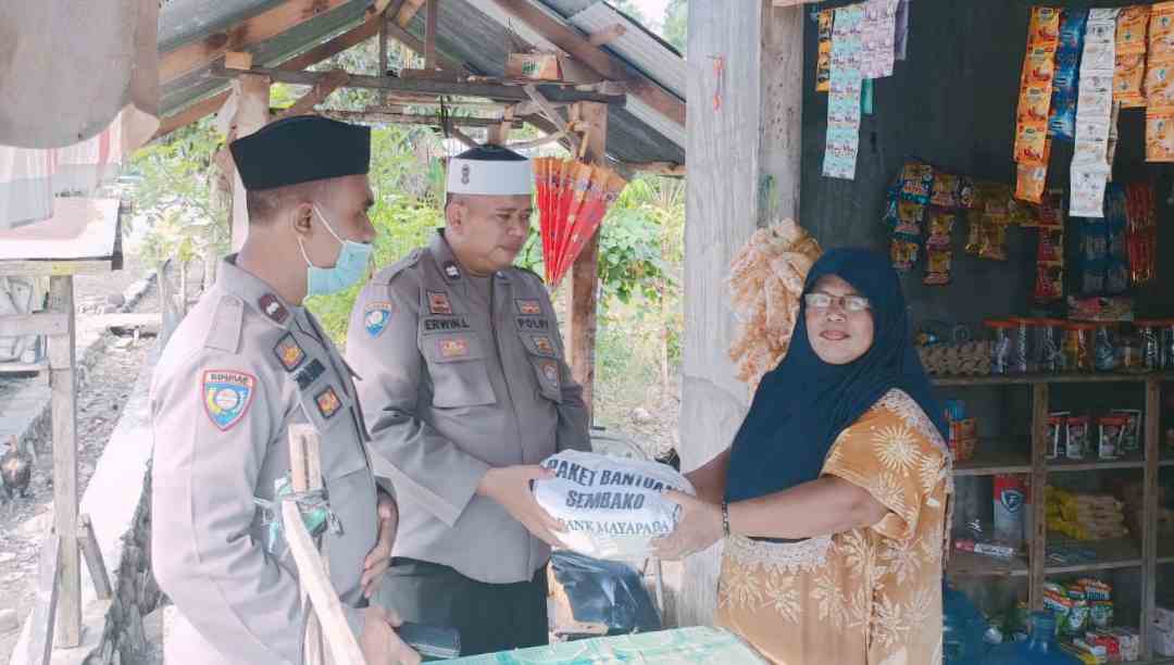 Polres Parimo dan Satgas Madago Raya Salurkan Paket Sembako
